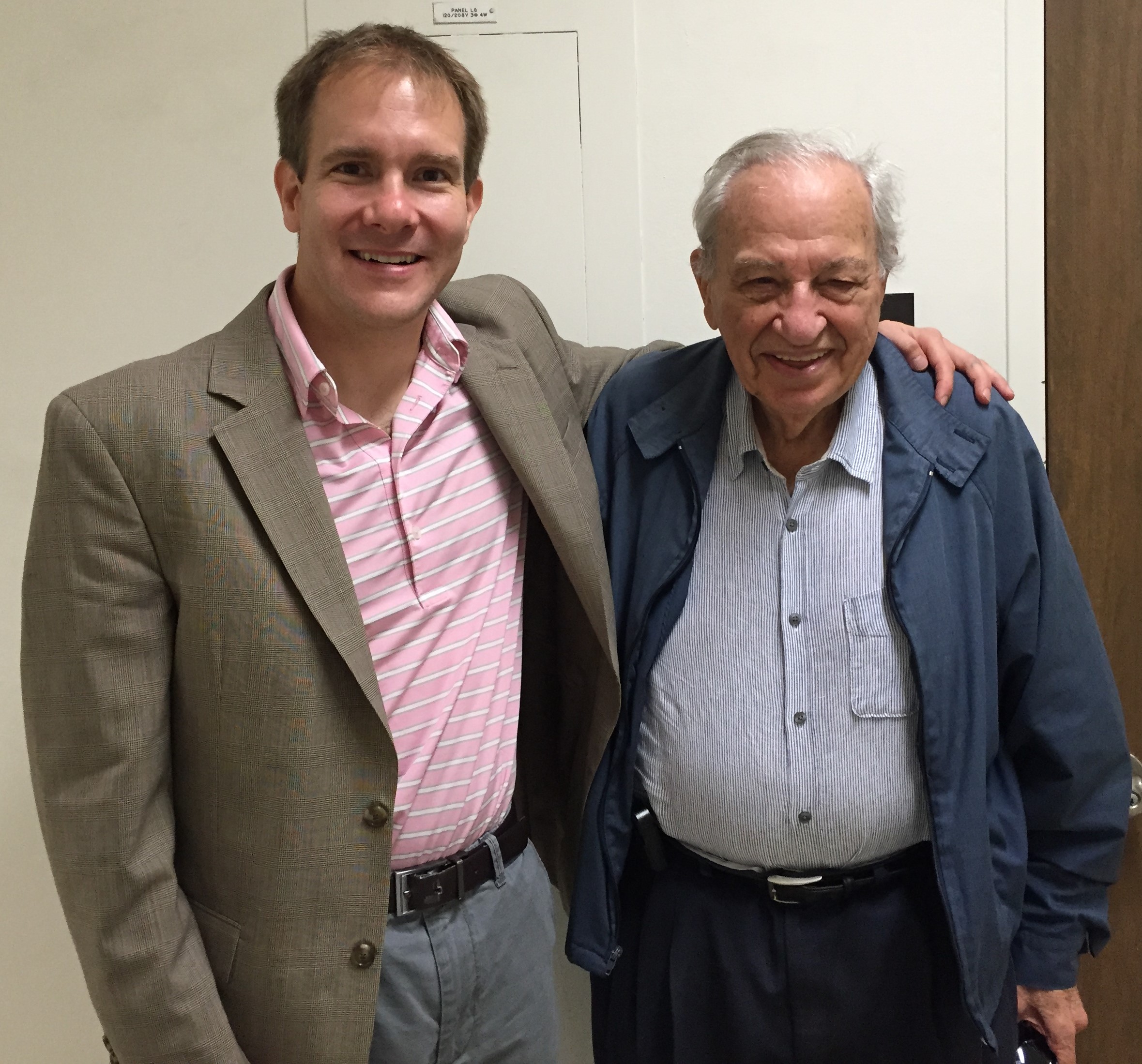 Shane and Rudy outside his office